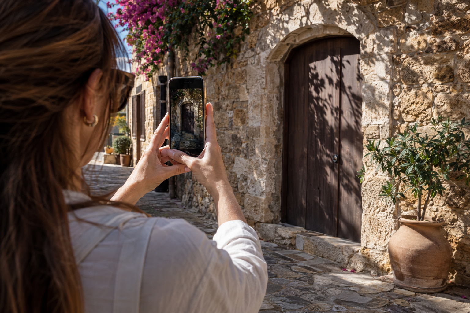 Photographing a doorway and shadow during an Old Town Paphos walk